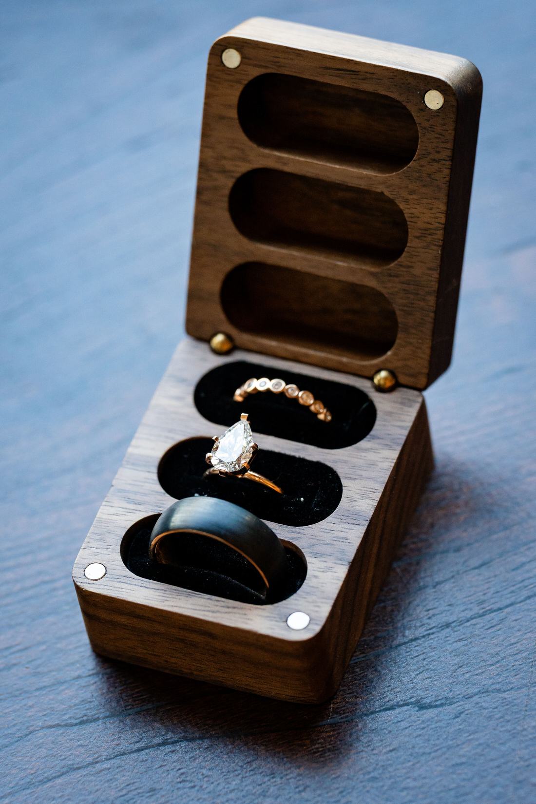 Wedding rings in a koa wood ring box